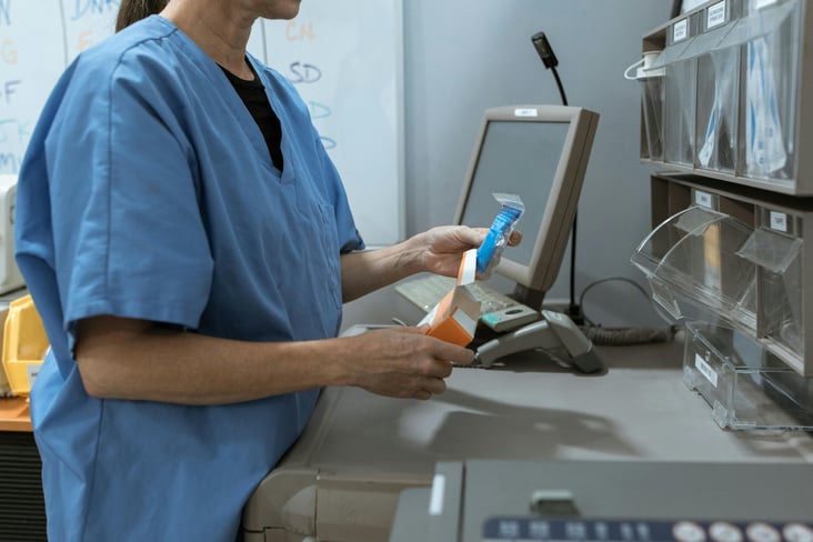 hospital staff administering medication 